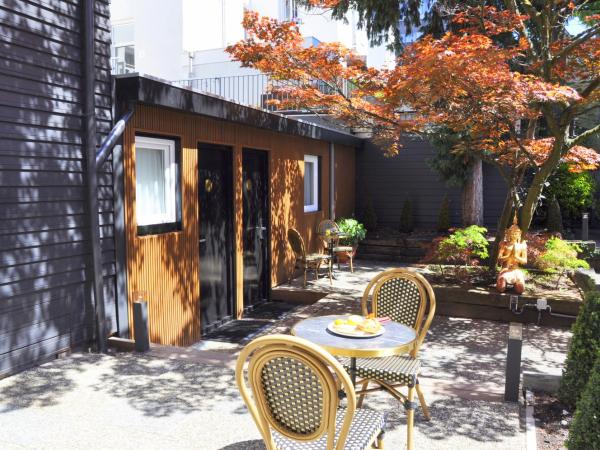 Huygens Place Amsterdam : photo 2 de la chambre chambre double - vue sur jardin