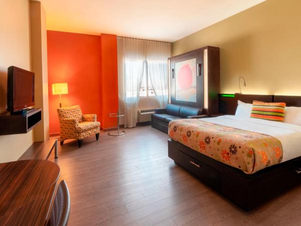Hotel Must : photo 2 de la chambre chambre quadruple avec baignoire