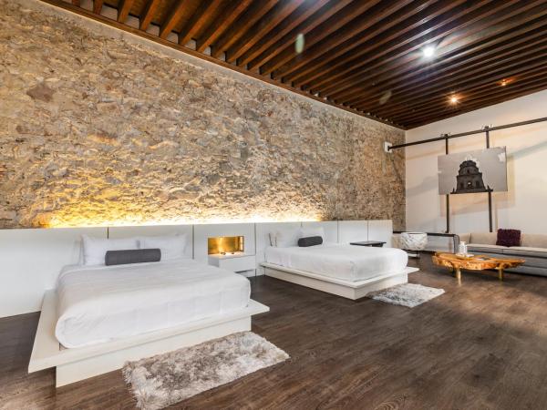 El Mesón de Santa Rosa : photo 1 de la chambre chambre deluxe avec 2 lits queen-size