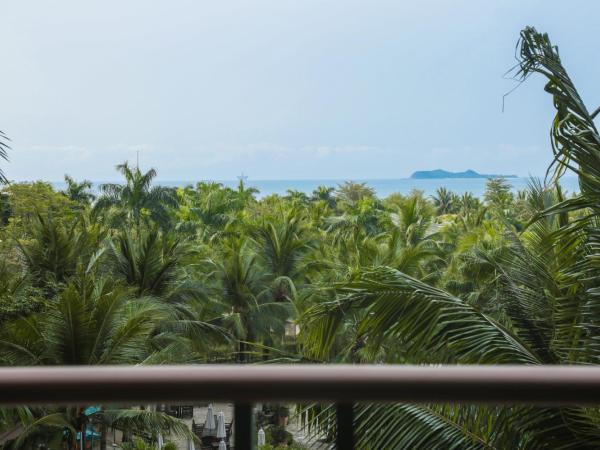 Howard Johnson Resort Sanya Bay : photo 3 de la chambre chambre lits jumeaux - vue sur jardin et sur mer