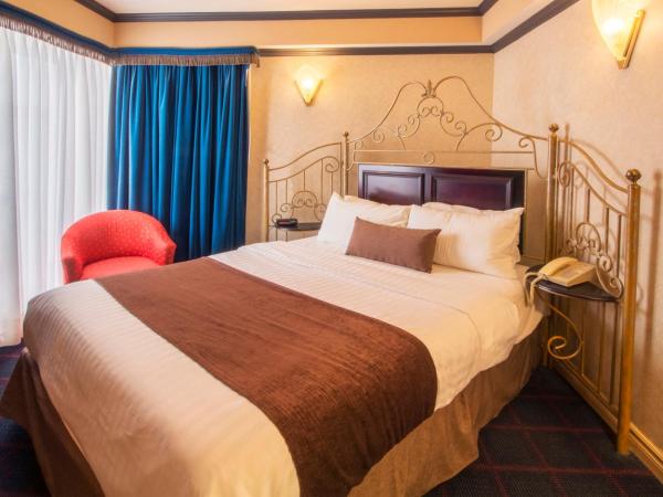 Auberge Québec : photo 1 de la chambre chambre lit queen-size avec canapé-lit et kitchenette