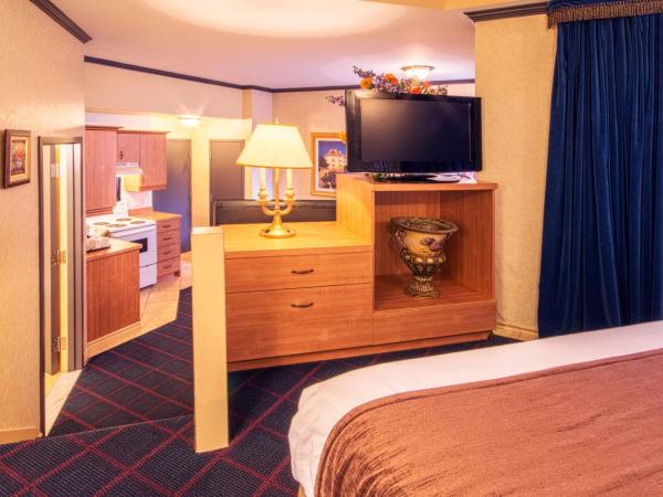 Auberge Québec : photo 2 de la chambre chambre lit queen-size avec canapé-lit et kitchenette