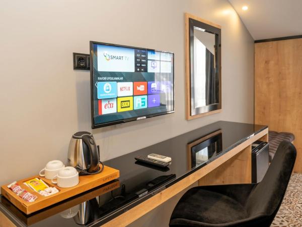 Grand Palace Hotel : photo 4 de la chambre chambre lit queen-size avec baignoire spa