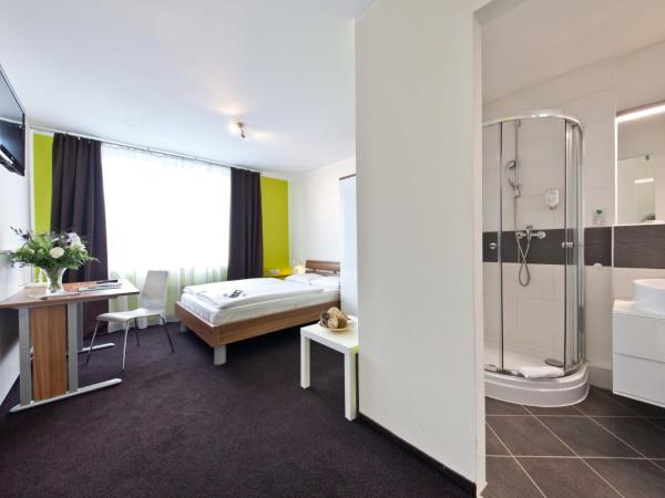 Novum Hotel Aviva Leipzig Neue Messe : photo 2 de la chambre chambre double avec 1 lit queen-size