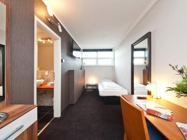 Novum Hotel Aviva Leipzig Neue Messe : photo 1 de la chambre chambre simple Économique