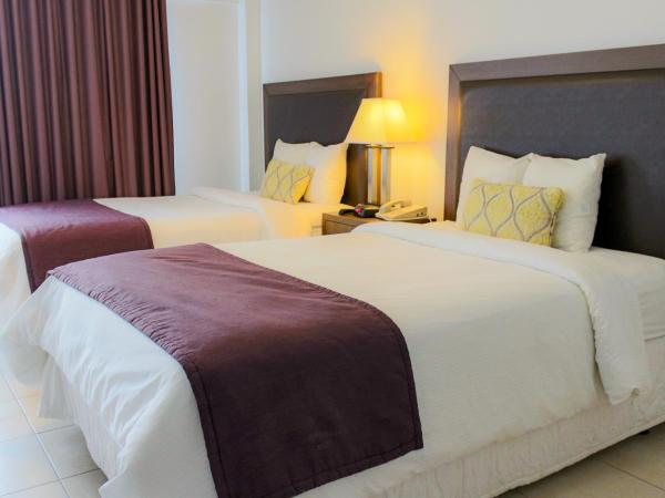 Collins Hotel : photo 2 de la chambre chambre double standard avec 2 lits doubles (sans frais de service)
