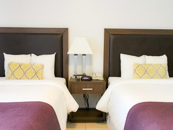 Collins Hotel : photo 6 de la chambre chambre double standard avec 2 lits doubles (sans frais de service)