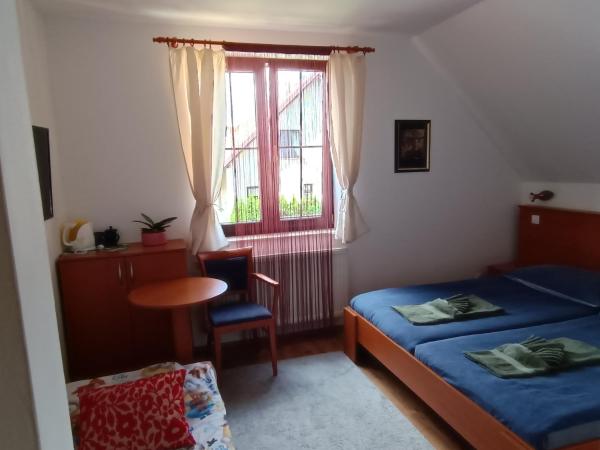 Pension Orbis : photo 2 de la chambre chambre triple Économique