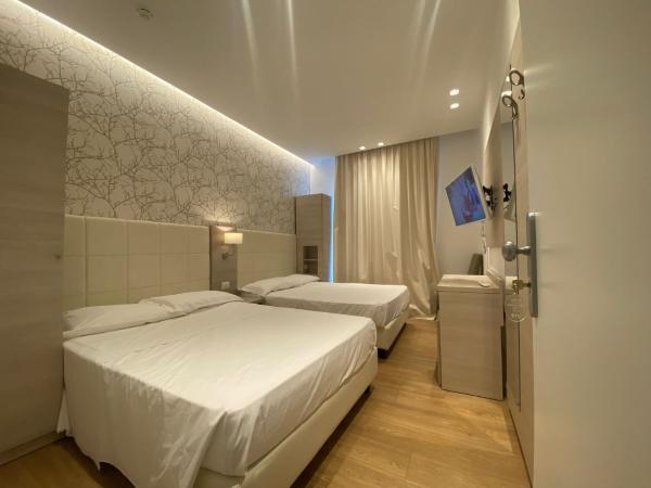 Feel Good : photo 2 de la chambre chambre quadruple - vue sur mer