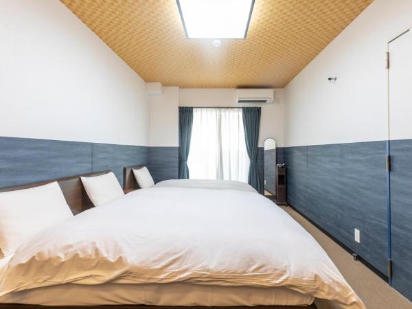 Tabist Kyogura Kyoto Nijo : photo 3 de la chambre chambre triple - non-fumeurs