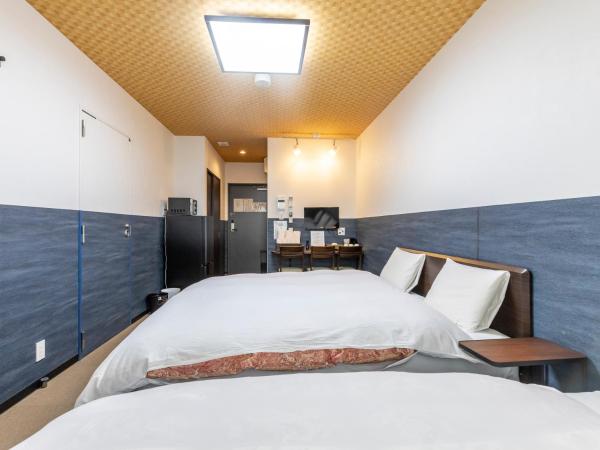 Tabist Kyogura Kyoto Nijo : photo 1 de la chambre chambre triple - non-fumeurs