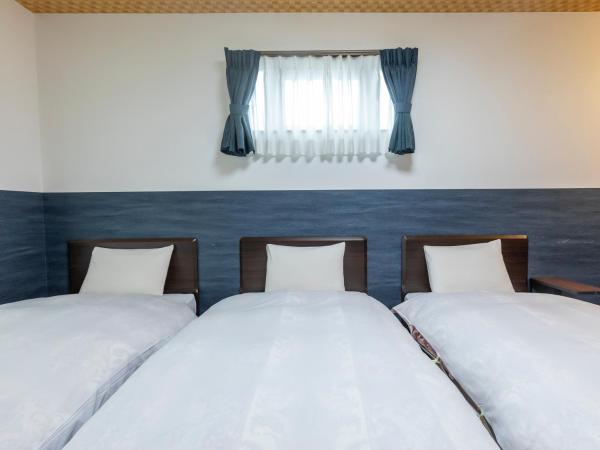 Tabist Kyogura Kyoto Nijo : photo 4 de la chambre chambre triple - non-fumeurs