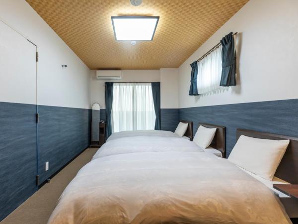 Tabist Kyogura Kyoto Nijo : photo 2 de la chambre chambre triple - non-fumeurs