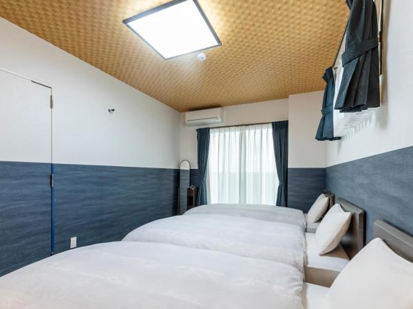 Tabist Kyogura Kyoto Nijo : photo 1 de la chambre chambre triple - non-fumeurs