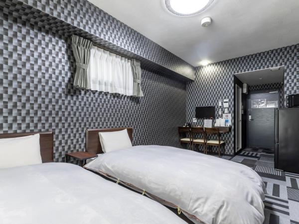 Tabist Kyogura Kyoto Nijo : photo 1 de la chambre chambre lits jumeaux standard - non-fumeurs