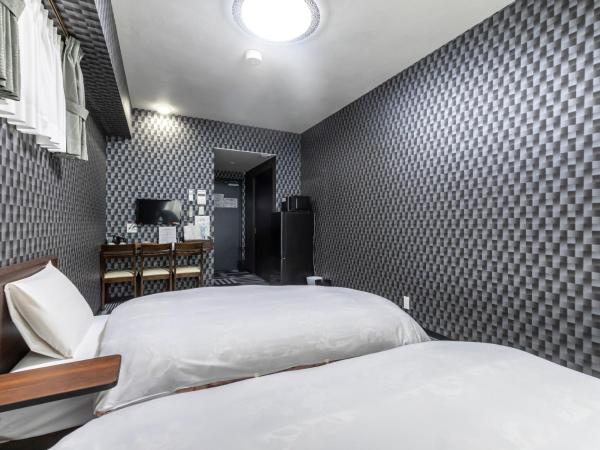 Tabist Kyogura Kyoto Nijo : photo 6 de la chambre chambre lits jumeaux standard - non-fumeurs