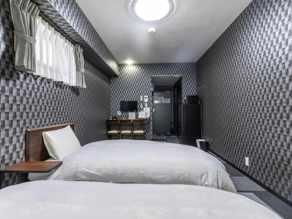 Tabist Kyogura Kyoto Nijo : photo 2 de la chambre chambre lits jumeaux standard - non-fumeurs