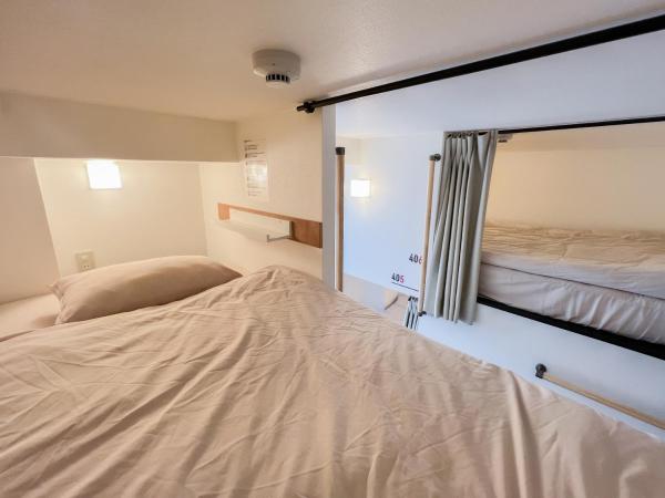Osaka Nipponbashi EVISU HOSTEL エビスホステル : photo 4 de la chambre lit simple dans dortoir pour femmes