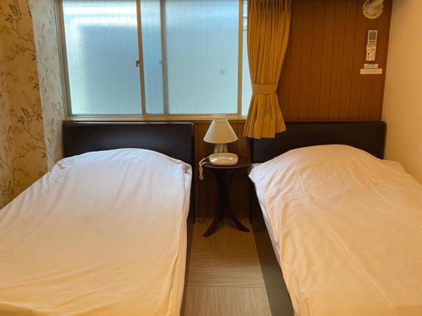 Oyado Cocochi : photo 3 de la chambre chambre lits jumeaux standard - non-fumeurs