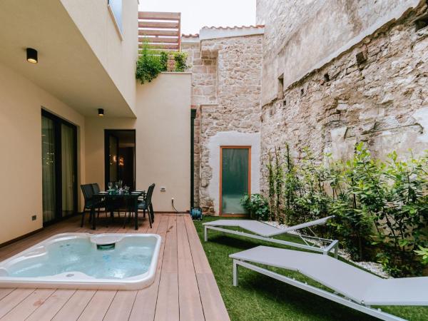 Armerun Heritage Hotel & Residences : photo 1 de la chambre appartement 1 chambre deluxe avec bain à remous