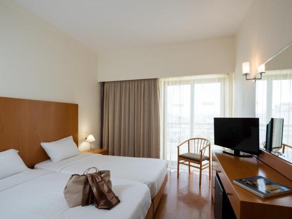 Angela Downtown Hotel : photo 1 de la chambre chambre lits jumeaux classique avec vue sur la piscine