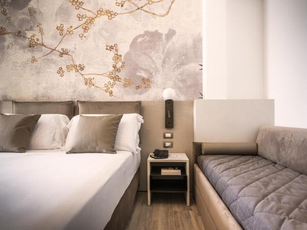 Life Hotel : photo 2 de la chambre chambre triple