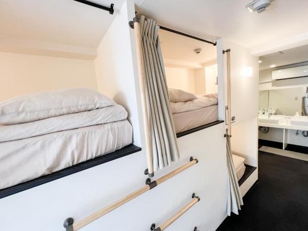 Osaka Nipponbashi EVISU HOSTEL エビスホステル : photo 3 de la chambre lit simple dans dortoir pour femmes