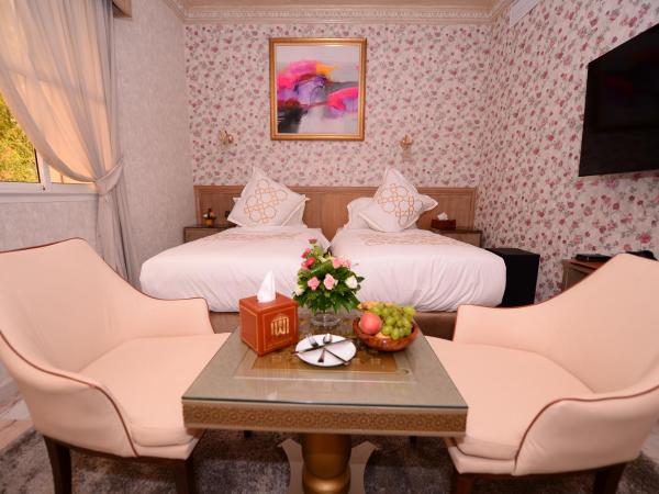 THE WHITE PALACE Rabat : photo 2 de la chambre chambre lits jumeaux - vue sur jardin