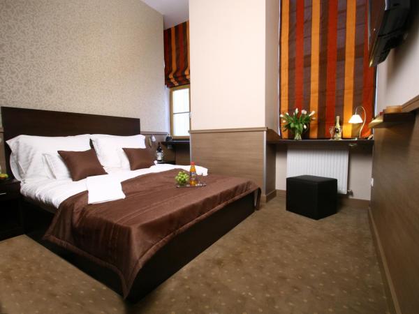 Central Hotel 21 and Apartments : photo 2 de la chambre chambre double - vue sur jardin