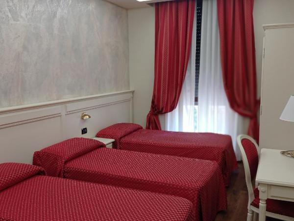 Hotel Galimberti : photo 1 de la chambre chambre triple