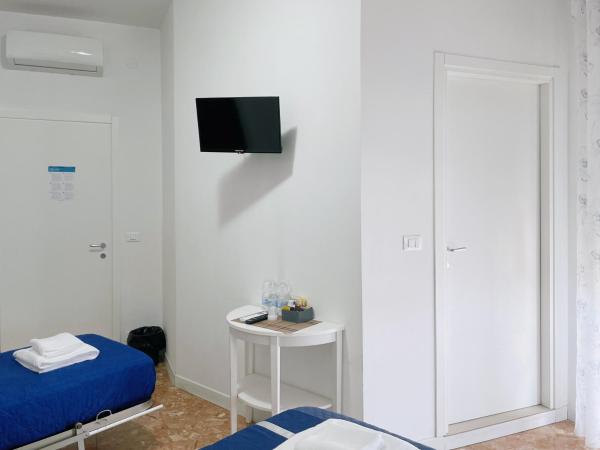 Confortini Rooms SUNDAY : photo 4 de la chambre chambre triple