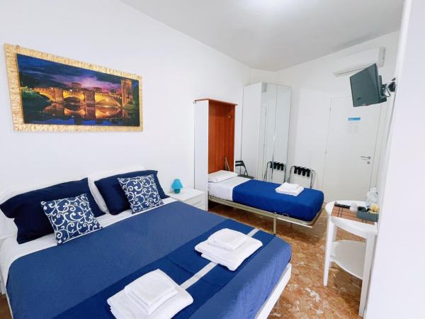 Confortini Rooms SUNDAY : photo 6 de la chambre chambre triple