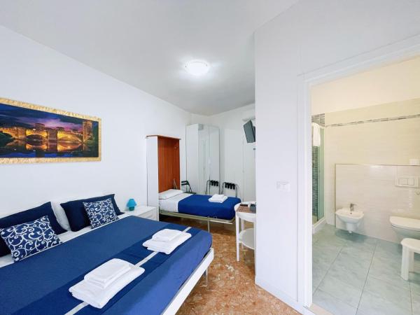 Confortini Rooms SUNDAY : photo 7 de la chambre chambre triple