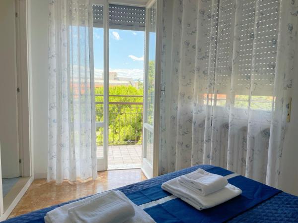 Confortini Rooms SUNDAY : photo 9 de la chambre chambre triple