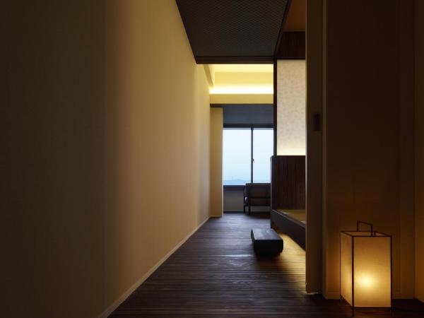 Negiya Ryofukaku : photo 6 de la chambre chambre lits jumeaux deluxe avec coin tatami - vue sur la montagne - tour ouest - non-fumeurs