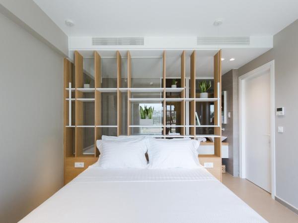 Noemie Luxury Suites : photo 5 de la chambre suite deluxe avec baignoire spa