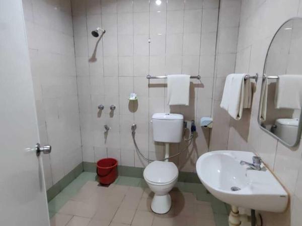 Century Hotel Inanam : photo 4 de la chambre chambre lit queen-size