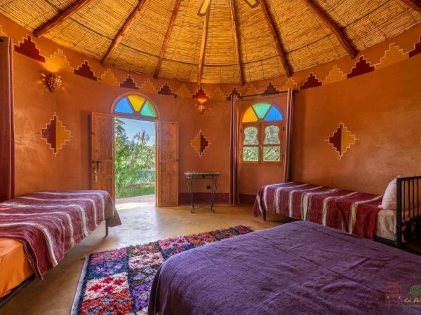 Ecolodge La Palmeraie : photo 6 de la chambre bungalow - vue sur jardin