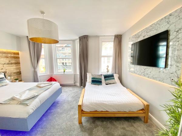 Coastline Retreats - Cloud9 Newly Renovated, Beautiful Ensuite Rooms Near Seafront in Town Centre, Netflix, SuperFast WiFi, Communal Kitchen : photo 6 de la chambre chambre double supérieure