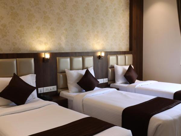 Mayuraa Residency : photo 2 de la chambre chambre triple exécutive