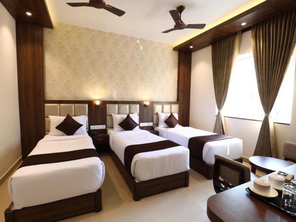 Mayuraa Residency : photo 1 de la chambre chambre triple exécutive