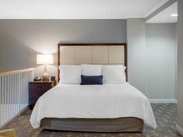 Omni Riverfront New Orleans : photo 4 de la chambre suite loft hospitalité avec lit king-size