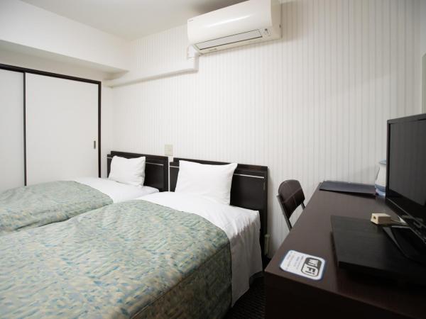 Business Inn Sennichimae Hotel : photo 3 de la chambre chambre lits jumeaux - non-fumeurs - sans ménage quotidien