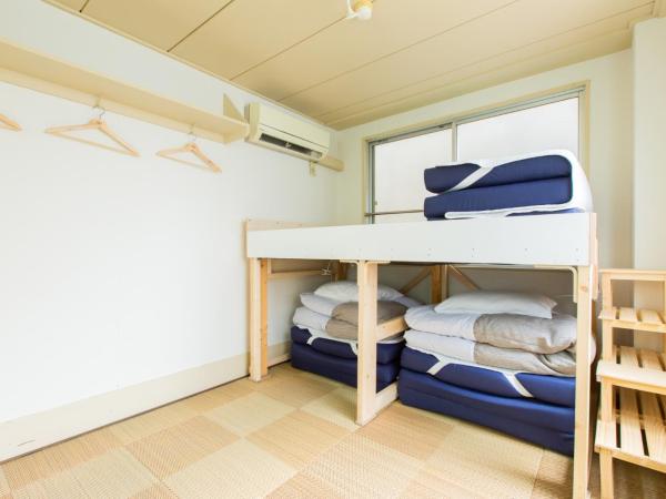 Guest House Shinagawa-shuku : photo 8 de la chambre chambre triple Économique avec salle de bains commune