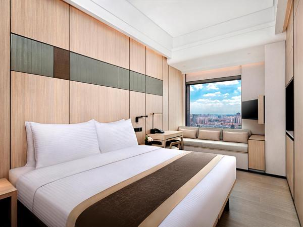 Harbour Plaza Metropolitan Shanghai : photo 1 de la chambre chambre lit king-size deluxe