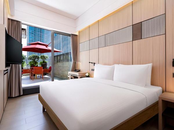 Harbour Plaza Metropolitan Shanghai : photo 1 de la chambre chambre lit king-size deluxe avec terrasse 