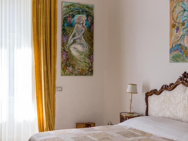 Gourmet B&B Villa Landucci : photo 5 de la chambre chambre deluxe double ou lits jumeaux