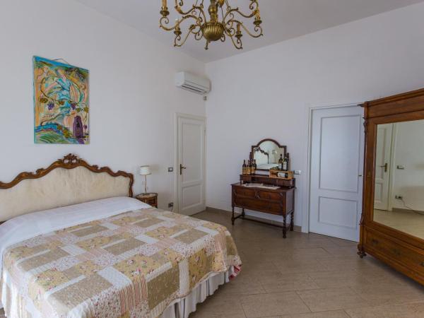Gourmet B&B Villa Landucci : photo 6 de la chambre chambre deluxe double ou lits jumeaux