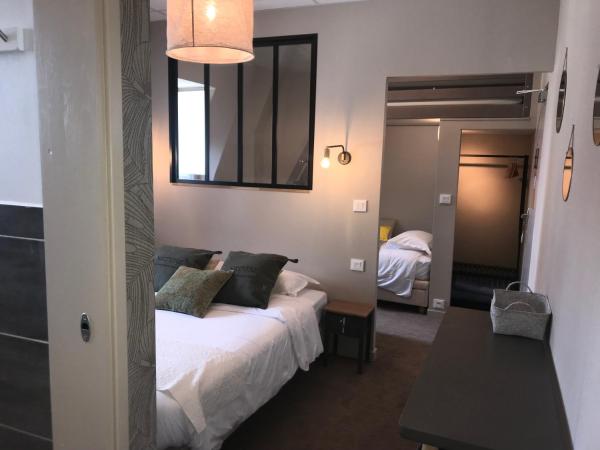 Cit'Hotel Les Alizes : photo 4 de la chambre chambre quadruple avec douche