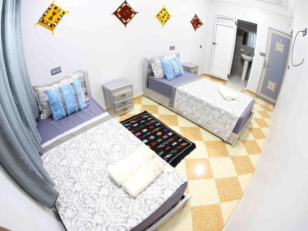 The Rina Hostel : photo 7 de la chambre chambre double ou lits jumeaux avec salle de bains privative